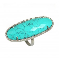 Synthetic turquoise oval silver cocktail ring